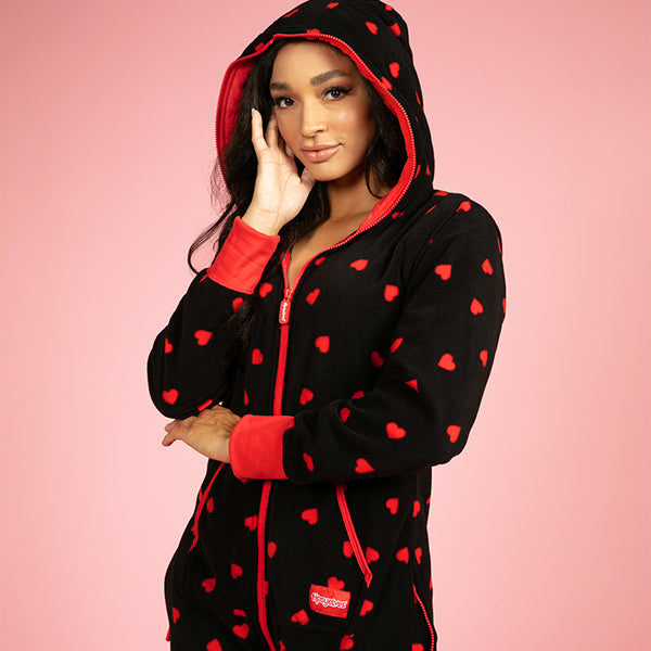 shop Valentine's Day - model wearing women's hearts on fire jumpsuit